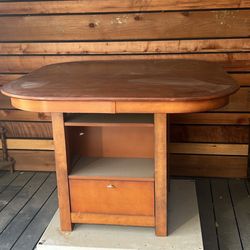 Dining Room Table With Some Interesting Storage Options Underneath 