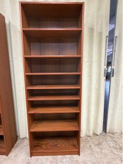 Tall shelving units with adjustable shelves