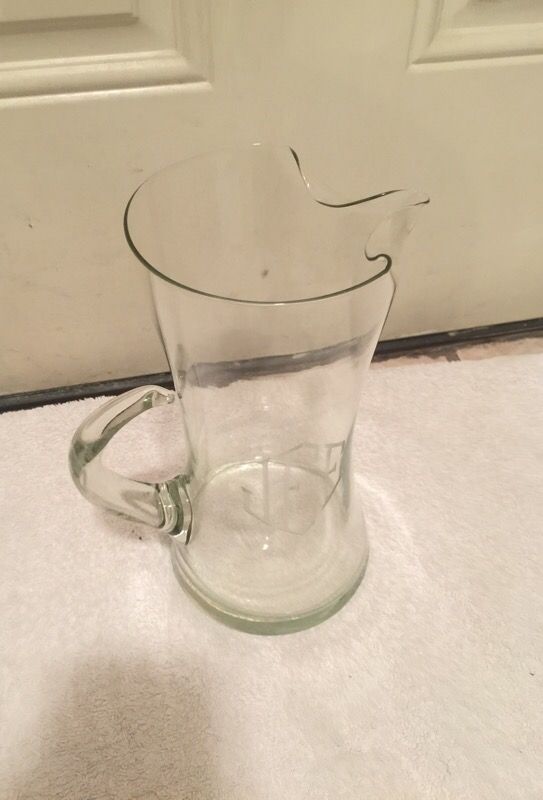 52 oz glass pitcher has J E E etched on front