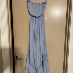 Adorable Brand New women’s size XS blue strapless romper. Gauze material. Never worn 