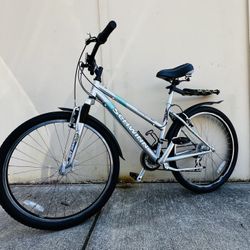 Schwinn 26" 21-Speed Hybrid Mountain Bike / 15" Frame / Front & Seat Suspension / Shimano Equipped / Rear Rack / Grip Shift