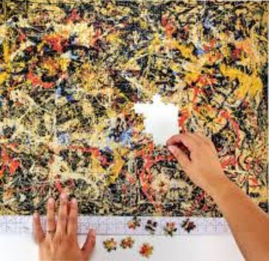 New Sealed Vintage 1994 Jackson Pollack "Convergence" 1000-piece Jigsaw Puzzle.
The image shows a completed 1000-piece jigsaw puzzle depicting Jackso