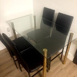 Rug ,couch ,table with Chairs