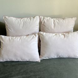 4 light pink pillows like new Pier 1