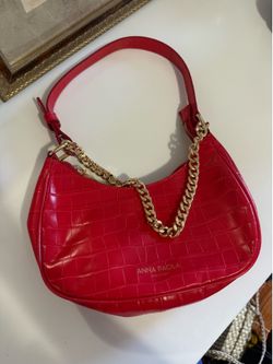 Red purse with gold chain