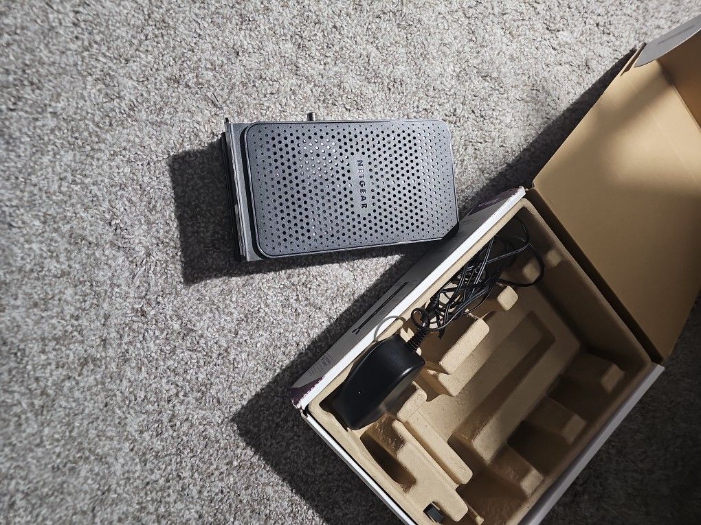 NETGEAR C3000 DOCSIS 3.0 Cable Modem + Wi-Fi Router (N300) – Box + Adapter