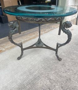 Claw feet accent glass table with Lion Heads 1800s-early 1900s- very heavy side table -22” tall x 28” wide- top was replaced with a very heavy glass i