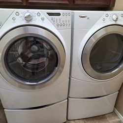 Whirlpool Duet Steam Front Load Electric Washer and Dryer with Pedestals.