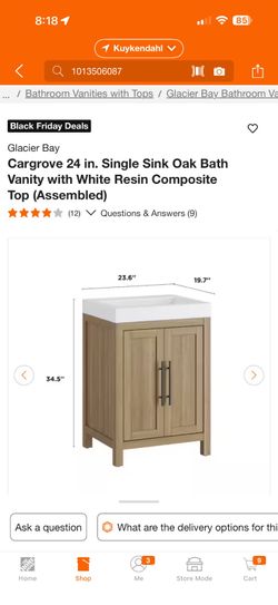 Cargrove 24 inch single sink oak bath vanity with white resin composite top. Fully assembled
