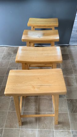 4 wooden stools