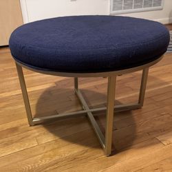 Round Upholstered Cocktail Ottoman w/Metal X-Shaped Base