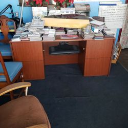 Wood Office Desk With Keys Lock Drawers And A Wooden Waste Basket 