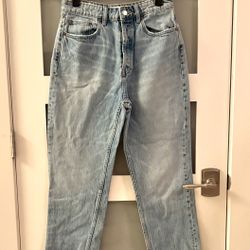 These jeans are the Zara High Rise Straight Jeans in a light blue wash with a frayed hem.
