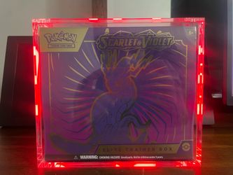 Pokemon Scarlet & Violet Elite Trainer Box with Funko Pop Pikachu 598 and Electabuzz 1124.