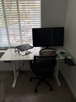 Computer standing desk with chair and monitor