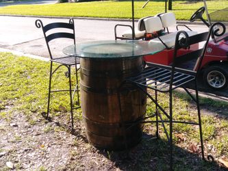 Jack table and 2 rod iron bar stools