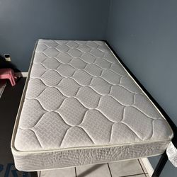 Clean Twin Mattress With Metal Base Frame 