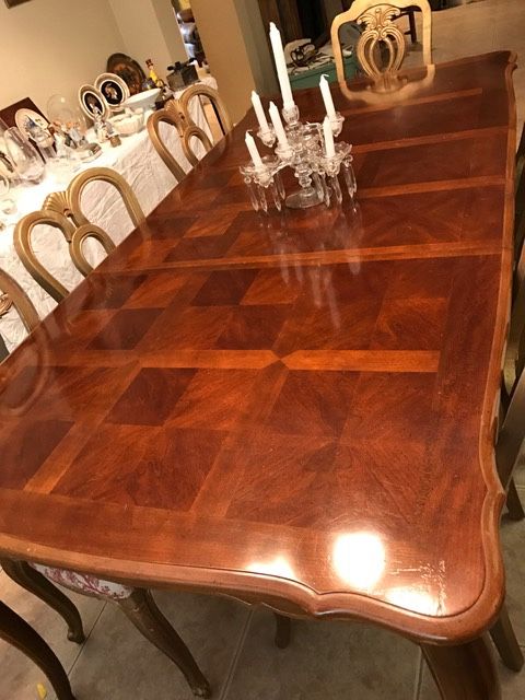 Large dining room table and eight chairs