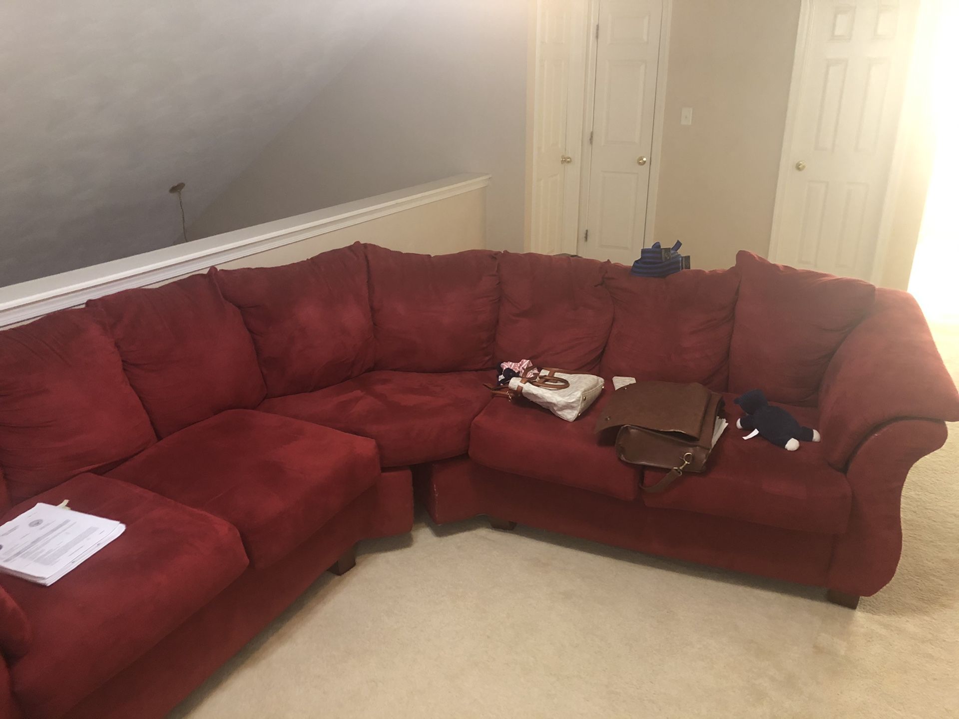 Crimson suede sectional couch
