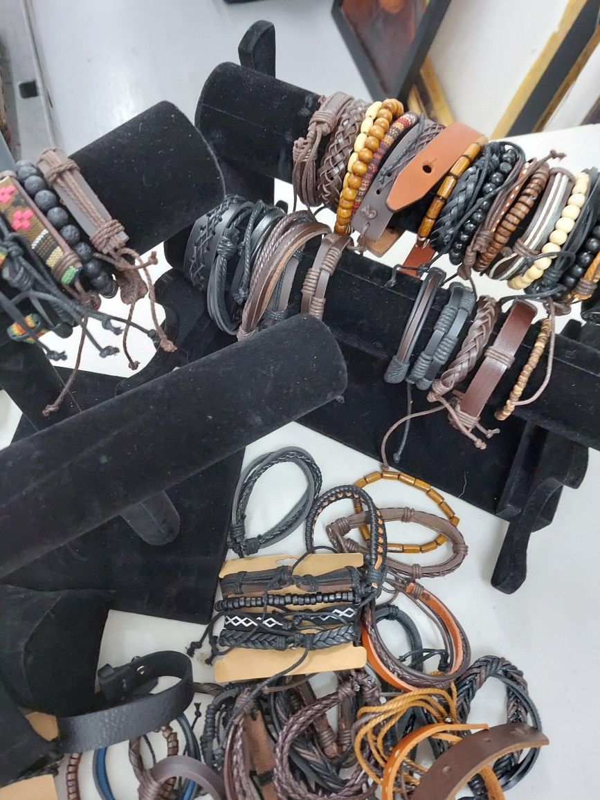 150 Pieces Of Leather Bracelets And Displays. Brand New