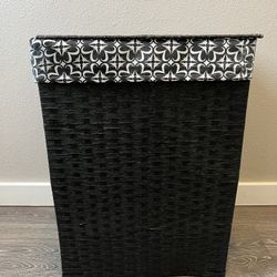 Black lined wicker hamper with lid