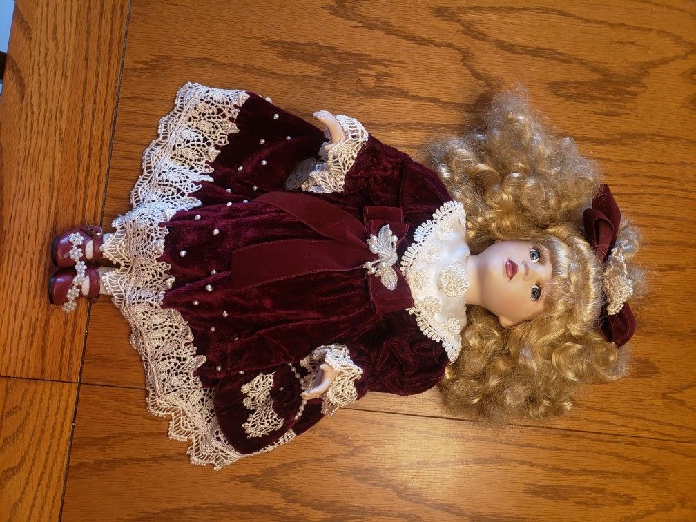 Porcelain Doll In Velvet Dress