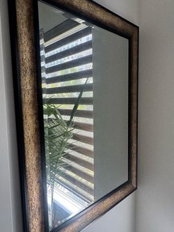 Gold mirror.