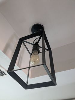Black light fixture with Edison light bulb
