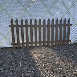 Gothic wood fence painted brown