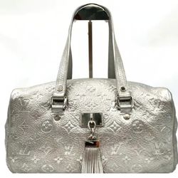 LV limited silver tassel handbag Boston bag

