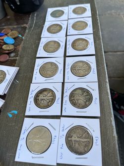 12 walking liberty 1/2 silver dollars