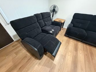 Black couch and love seat recliner