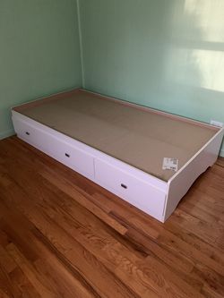 Bedframe with drawers, table and chair