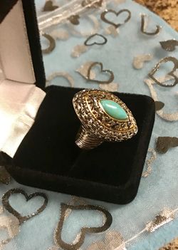 Gold tone turquoise ring