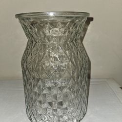 Clear glass vase with a diamond-faceted pattern