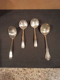 Vintage personal soup ladles.
