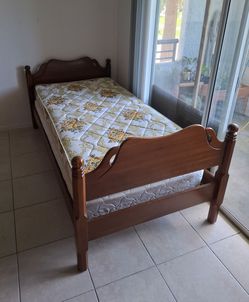 Solid wood twin bed with box spring and mattress