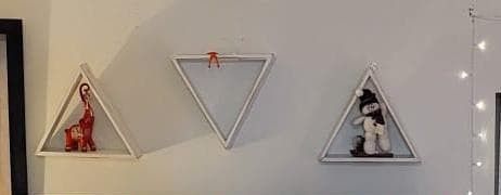 decorative white wooden triangle wall shelves