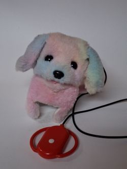 Small puppy talks and walks toys