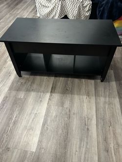 Coffee table with lift top