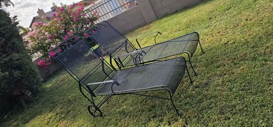 **2 Wrought Iron Chaise Lounge Chairs**