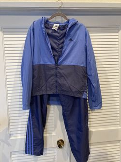 Woman’s adidas track suit Size M
