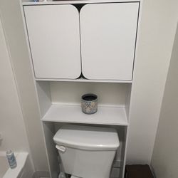 Cute Overhead Bathroom Storage! 