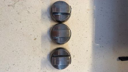 Three black chrome, LG oven stove knobs OEM