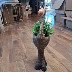 PENDING PICK UP - Giraffe plant stand inside or outside