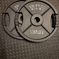 New set of two 45 lb Olympic weight plates (90 lbs total). Never used.