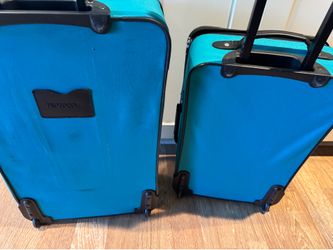 Suitcase and carry on - both