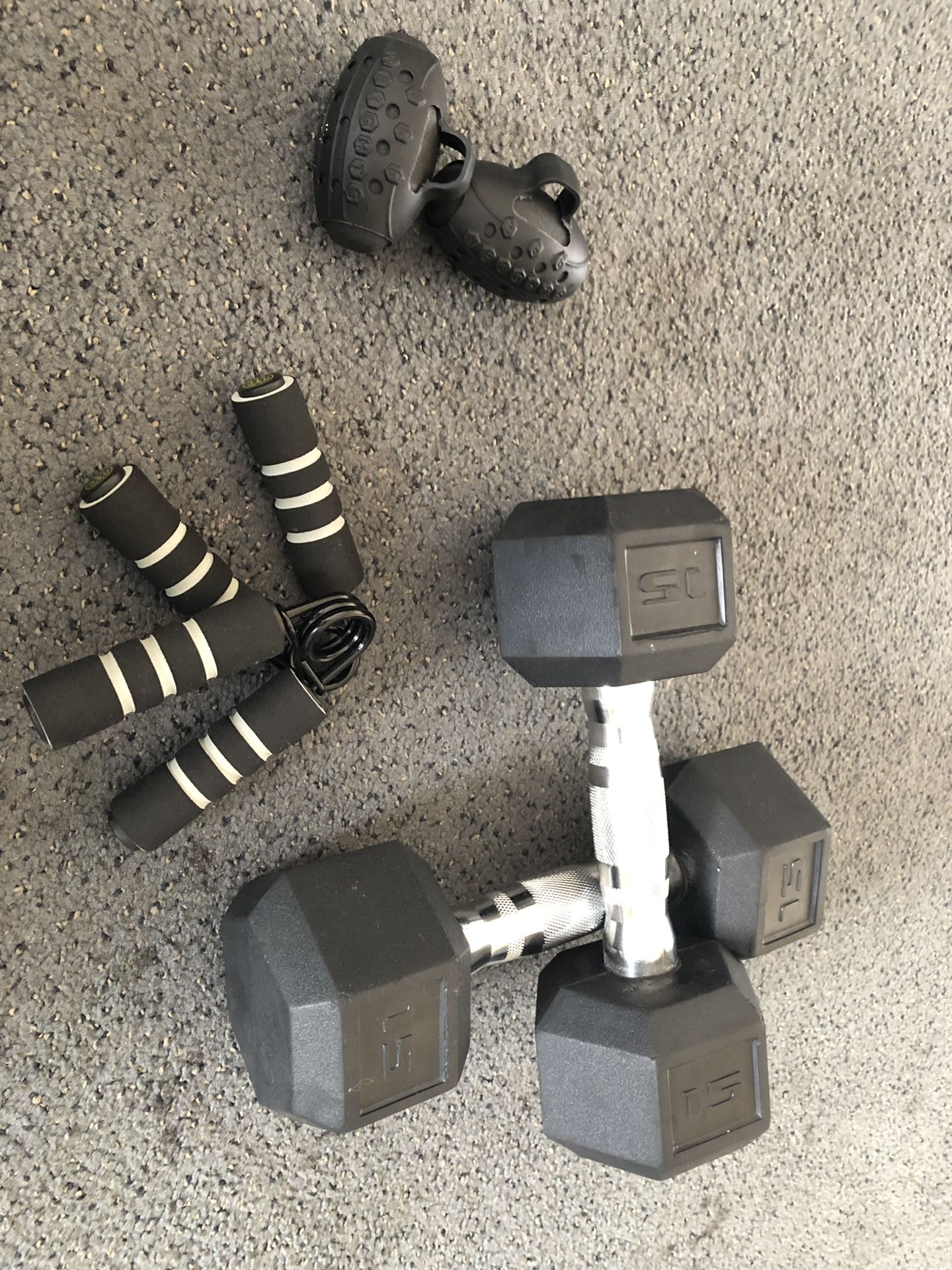 15 pound weights , 1.5 pound egg weights and hand grips.