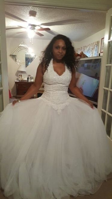 Brand new wedding gown never worn $275.00 more pictures upon request