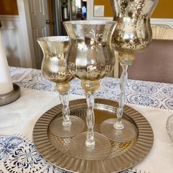 A Set Of Candle Holders